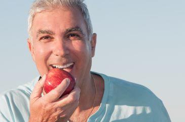 older man with dental crowns in fort lauderdale
